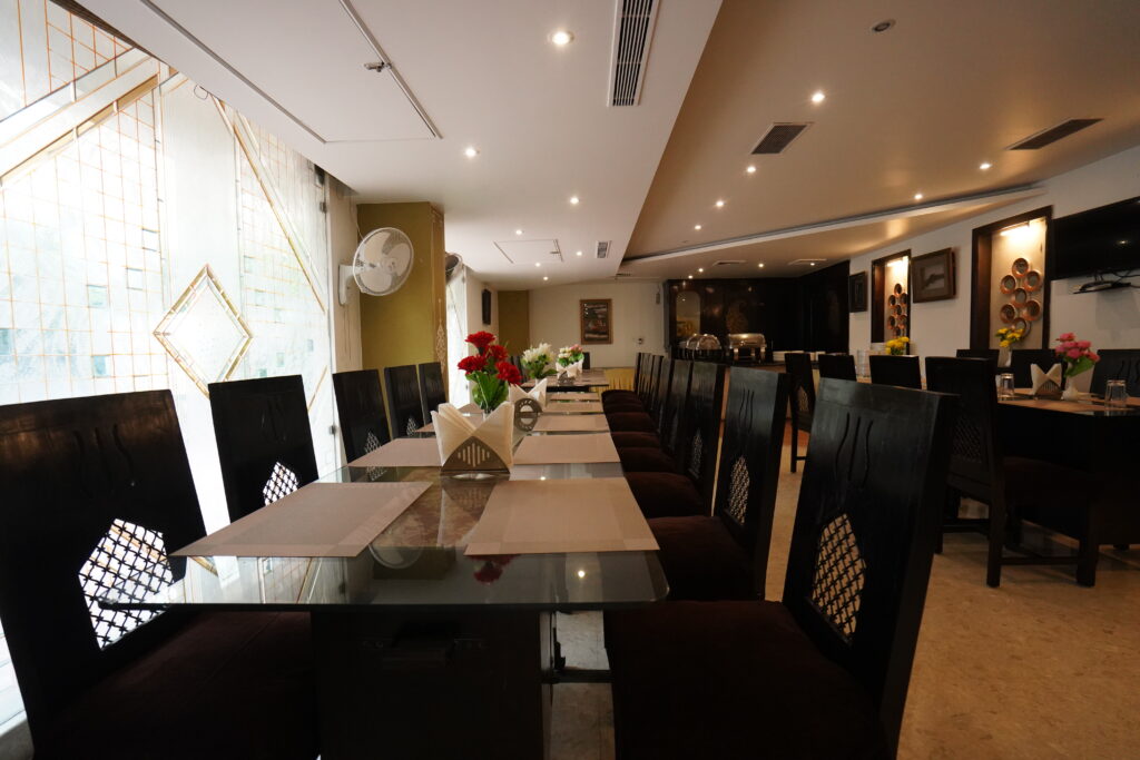 Modern dining area at Maru Casa Jaipur with elegant seating and décor